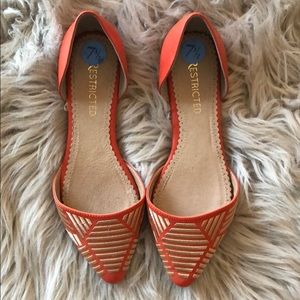 Orange flats with gold detail